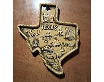 Arazzo da parete in ceramica a forma di stato del Texas con punti di riferimento e piatto con finitura dorata, posacenere, targa, portaspazzole