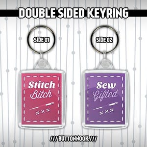 May include: Double-sided keychain with a pink square featuring the text "Stitch Bitch" and a needle and thread design, and a purple square featuring the text "Sew Gifted" and a needle and thread design.