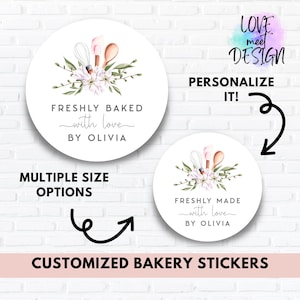 May include: White round stickers with watercolor illustrations of baking tools and floral accents. Text reads "FRESHLY BAKED with love BY OLIVIA" and "FRESHLY MADE with love BY OLIVIA". The image also says "CUSTOMIZED BAKERY STICKERS".