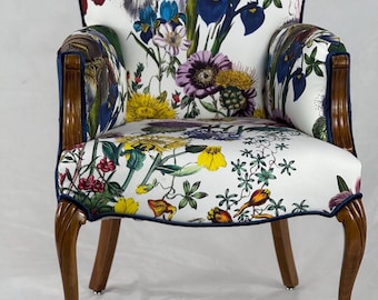 Free shipping- available- 1 chair vintage chair redone in large vibrant floral cotton fabric on the front and royal blue/ navy velvet on the
