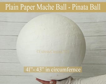 May include: A large, plain white paper mache ball designed as a pinata. The surface has a textured, layered appearance. Text on the image reads: Plain Paper Mache Ball - Pinata Ball, ExtremeCreation2023, and 41-43 inches in circumference.