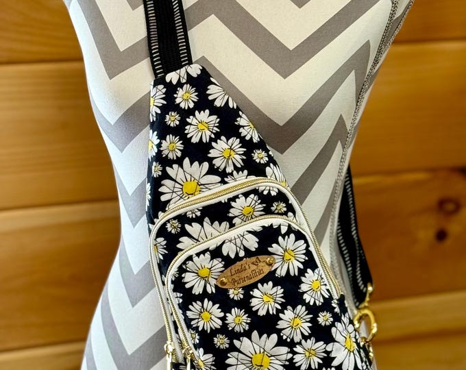 Featured listing image: Heartland Slng Backpack, Quilted Cotton Black with White Daisies