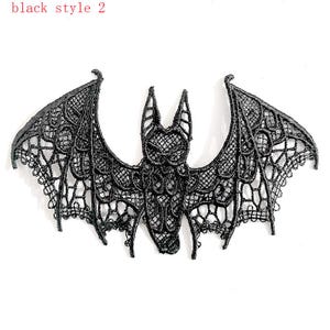 May include: A black lace bat with detailed openwork wings. The bat design is intricate and delicate. The text "black style 2" is in the upper left corner. This is a decorative item.