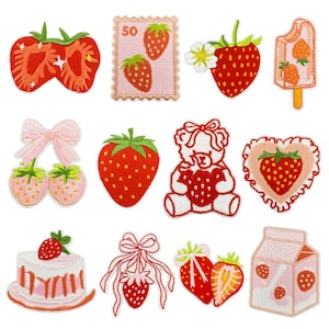 May include: A collection of twelve embroidered patches featuring strawberry-themed designs, including a sliced strawberry, a postage stamp with the number 50, a strawberry popsicle, cherries with a bow, a teddy bear, a heart, a cake, and a milk carton.