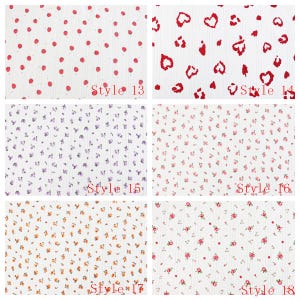May include: A collection of six white fabric swatches with ribbed textures, each featuring distinct patterns: red dots, red heart-shaped leopard spots, purple floral sprigs, pink floral buds, orange floral clusters, and red rosebuds, labeled Style 13 to 18.
