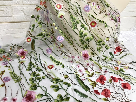 Embroidered floral lace fabric deals