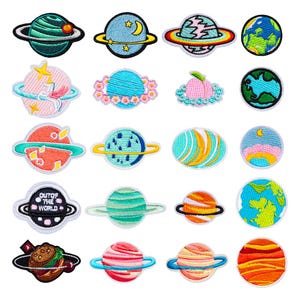 May include: A collection of twenty embroidered patches featuring various celestial bodies, planets with rings, and Earth-like spheres. The designs include vibrant colors like blue, green, pink, and orange, with one patch displaying the text OUT OF THE WORLD.