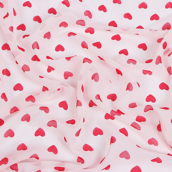 Floating Red Hearts on Bright Pink Fabric