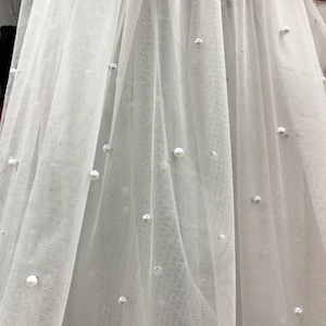 Soft tulle fabric by the yard, ivory pearl beaded lace fabric for tulle wedding ceremony robe, bridal veils or tutu dress