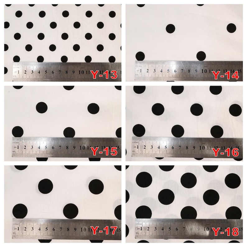 May include: A collection of six white fabric swatches featuring black polka dots of varying sizes, each labeled with a red code from Y-13 to Y-18 and displayed with a metal ruler showing measurements in centimeters up to 15 cm.