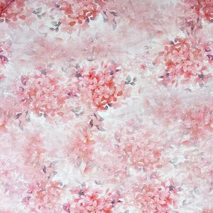May include: A repeating pattern of soft pink cherry blossom clusters set against a textured, off-white background. The floral design features delicate petals in varying shades of pink with subtle hints of greyish-green leaves throughout.