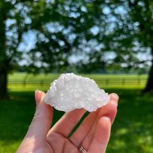 Fluorescent Calcite Cluster on Quartz