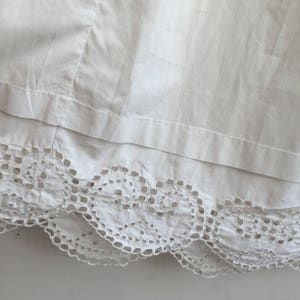 antique vintage hand embroidered boucle stitches folk skirt with scalloped crochet lace edging hem
