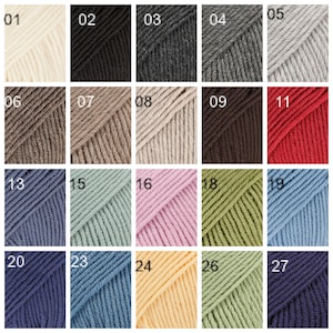 May include: A collection of 27 yarn skeins in various colors, including white, black, gray, brown, red, blue, green, pink, and yellow. The skeins are arranged in a grid pattern with numbers 01 through 27.