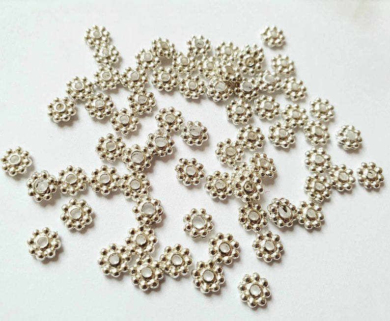 200x Silver spacer beads 5.5mm daisy flower, silver plated pack of 200 SBS020 Bild 1