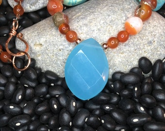 Necklace of Carnelian with Dyed Blue Magnesite Accents with Faceted Light Blue Glass Focal on Copper - Balance, Creativity and Tranquility