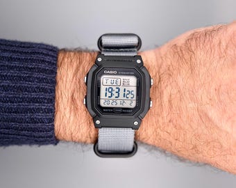 Modified Casio W800H digital watch: "Nightstone" – duotone violet/turquoise backlight gradient, Timer function unlocked