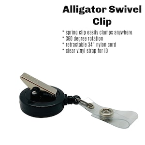 K&ouml;nnte beinhalten: Schwarzer einziehbarer Ausweishalter mit Alligatorclip, einem 86 cm langen Nylonband und einem durchsichtigen Vinylband f&uuml;r einen Personalausweis. Die Rolle hat eine 360-Grad-Drehung.