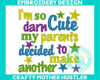 May include: Embroidered design with the text "I'm so darn Cute my parents decided to make another" in colorful letters with stars. The text "Crafty Mother Hustler" is at the bottom of the design.