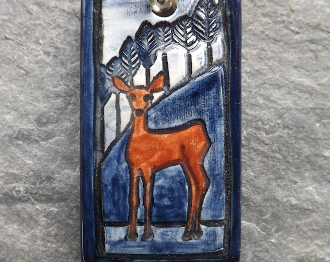 Handmade Ceramic Deer pendant in blue