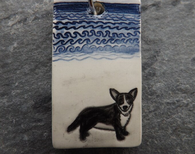 Handmade Ceramic Corgi on the beach pendant