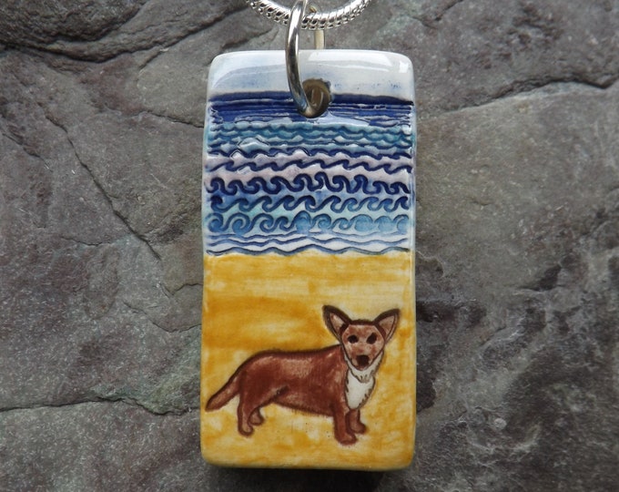 Handmade Ceramic Corgi on the beach pendant