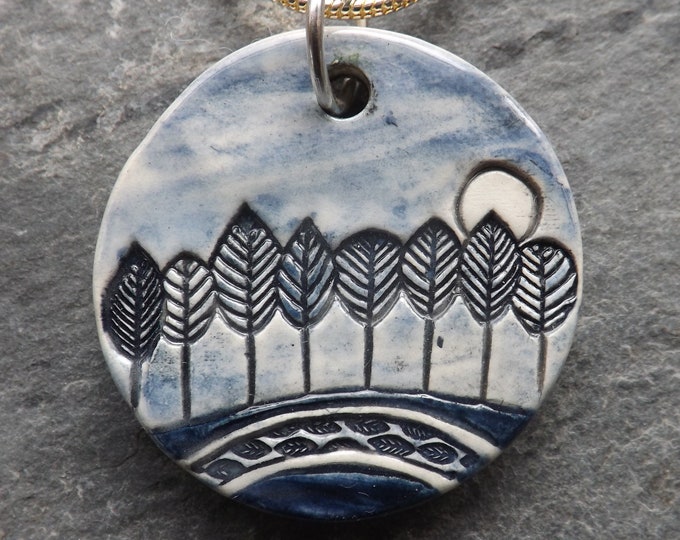 Handmade Ceramic Moonlit Trees pendant in blue, tree lover gift