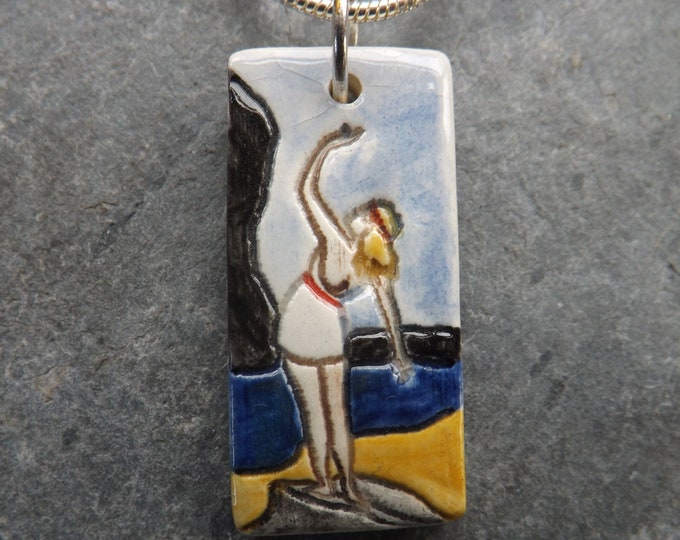 Handmade Ceramic Rock Goddess Pendant in white, blue and yellow