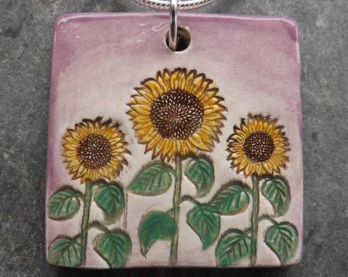 Handmade Ceramic Sunflowers pendant in yellow and purple