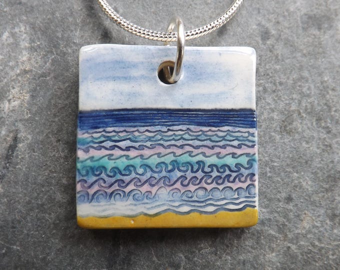 Ceramic Waves pendant in blue, purple and turquoise