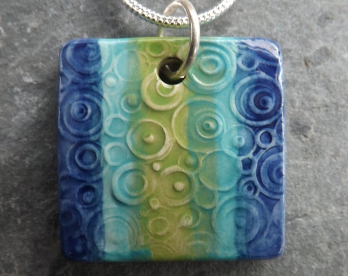 Handmade Ceramic Ripples Pendant in blue, turquoise and green