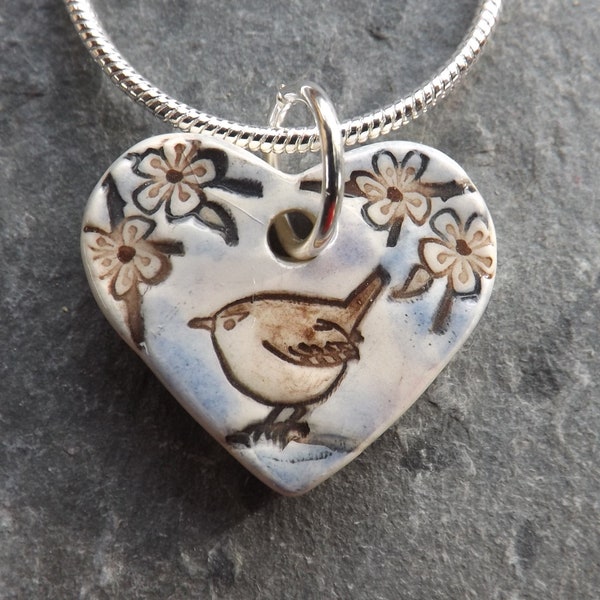 Ceramic heart shaped Wren in the Blackthorn pendant in blue