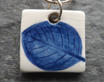 Handmade Ceramic Leaf pendant in blue, tree lover gift