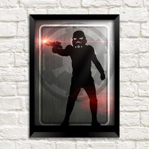 May include: A black and white silhouette of a Star Wars Stormtrooper holding a blaster rifle. The Stormtrooper is standing in front of the Rebel Alliance symbol. The image has a red glow around the Stormtrooper and blaster rifle.