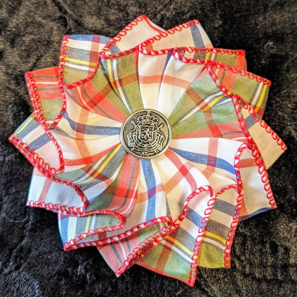 Red, Green, Blue, Yellow and White Plaid Cockade Rosette Pin with a silver coat of arms button centerpiece