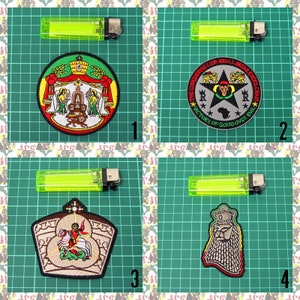 May include: Four embroidered patches with various designs, including a lion, a coat of arms, and text. Each patch is accompanied by a neon green lighter. The patches feature detailed stitching and a variety of colors, suitable for clothing or accessories.