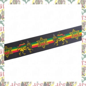 Puede incluir: Cinta negra con un patrón repetido de una Estrella de David, un león y los colores rastafaris: rojo, amarillo y verde. Adecuada para diversos proyectos de manualidades.