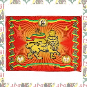 May include: A red, yellow, and green flag with a golden lion holding a staff with a crown and a star on top. The lion is standing on a red background with yellow rays emanating from the center. The flag has the words "Conquering Lion of the Tribe of Judah" at the bottom.