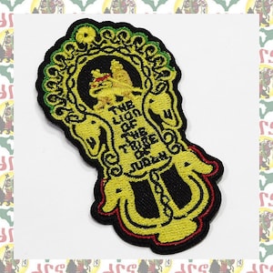 May include: A yellow and black embroidered patch with a lion and the text "The Lion of the Tribe of Judah".