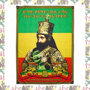 May include: A green, yellow and red flag with a portrait of Emperor Haile Selassie I of Ethiopia. The flag has the words "የኢትዮጵያ ቀዳማዊ ኃይለ ሥላሴ ንጉሠ ነገሥት" in Amharic, which translates to "Emperor Haile Selassie I of Ethiopia".