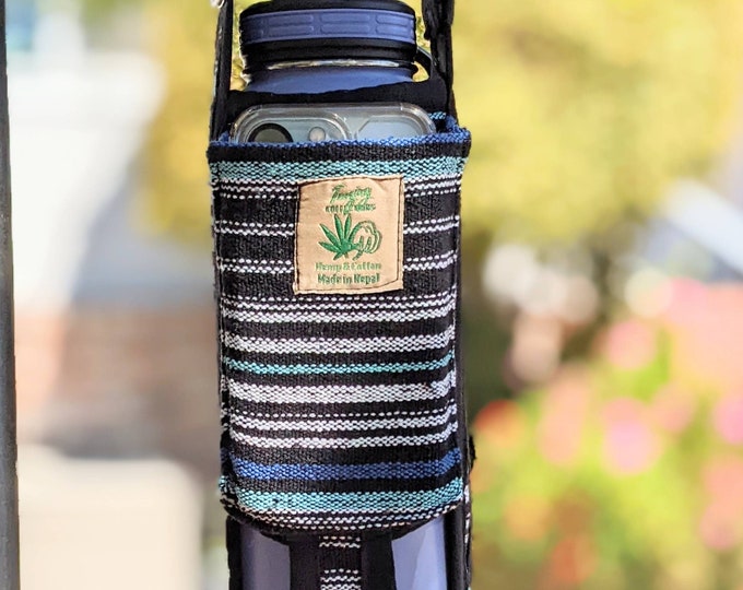 Water bottle holder and phone Pocket or small change Pocket