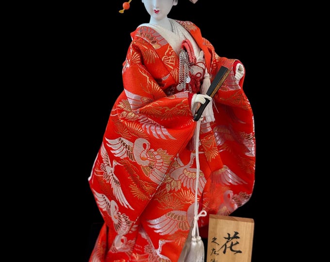 Bride Geisha Girl Doll Gorgeous and adorable geisha doll. is dressed in an opulent traditional costume.