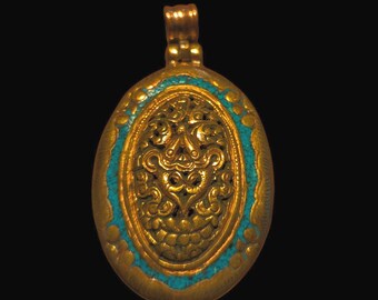 PE109 Tibetan Pendant Handmade in Nepal, this auspicious Buddhist pendant is a good luck charm.