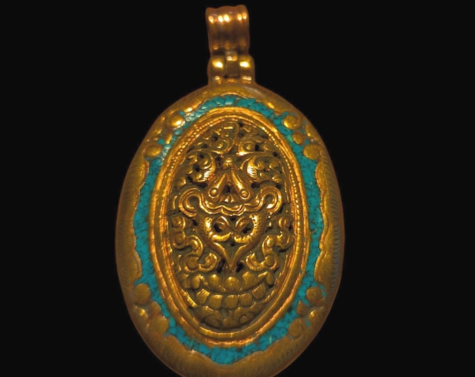 PE109 Tibetan Pendant Handmade in Nepal, this auspicious Buddhist pendant is a good luck charm.