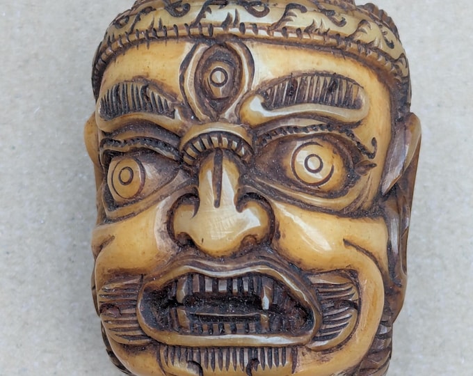 Antique Yak Bone Skull Bead: Hand-Carved Mahakala Protector Deity Pendant