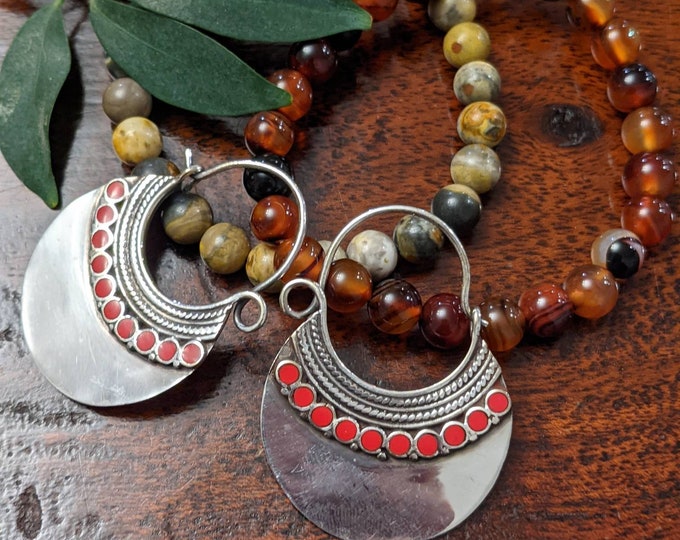 Hoop earrings with gem stone. Ethnic look brass earrings chooses of different stone. Coral, turquoise, lapis lazuli and malachite