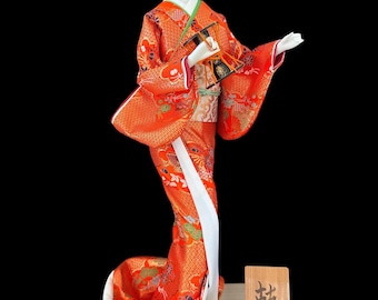 Drum Geisha Girl Doll This gorgeous and adorable geisha doll. Dressed in an opulent traditional costume.