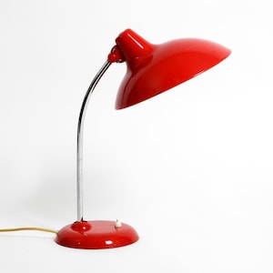 Original classic red Kaiser Idell metal table lamp model 6786 from the 1960s