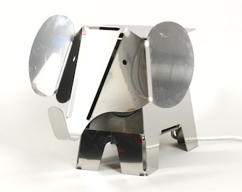 1980s heavy metal chrome elephant floor lamp as side table Postmodern design
