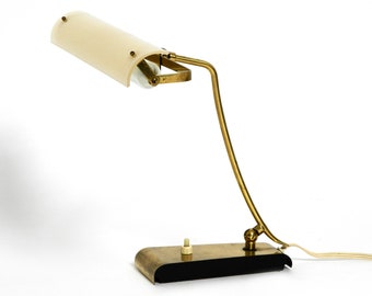 Very rare Mid Century Modern brass desk lamp with a plexiglass shade and plug-in bulb